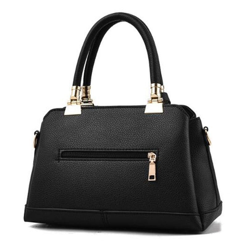 Damen-Handtaschen aus Leder mit Ästen aus Metall