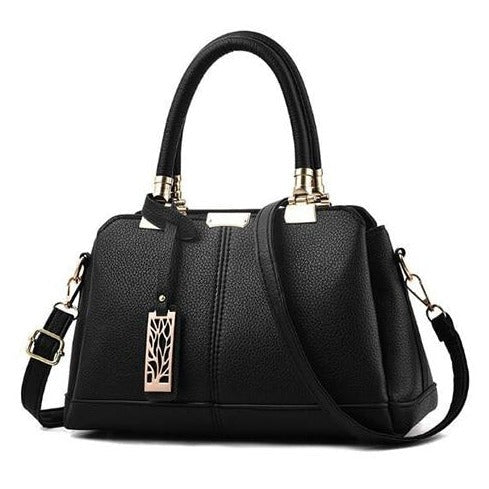 Damen-Handtaschen aus Leder mit Ästen aus Metall