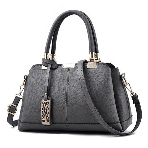 Damen-Handtaschen aus Leder mit Ästen aus Metall